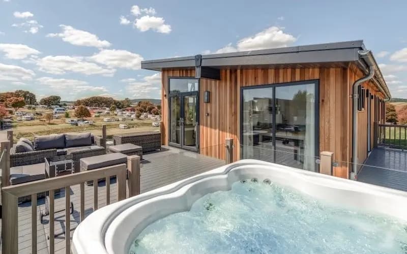 Accommodation Online Competitions UK: Win a 7-night luxury lodge stay at Cofton Holidays with private hot tub, meal for four, and indoor pool passes. Hosted by Woman Magazine.